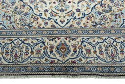 Full view of 2000s Kashan rug from Iran / Persia, 306 × 195 cm in Beige tones