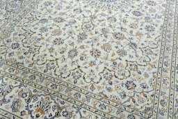 Close-up detail of 2000s Kashan rug from Iran / Persia showing Wool weave