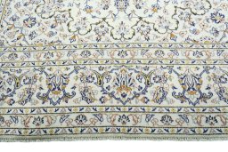 Full view of 2000s Kashan rug from Iran / Persia, 357 × 246 cm in Beige tones