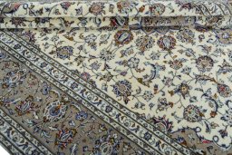 Close-up detail of 2000s Kashan rug from Iran / Persia showing Wool weave