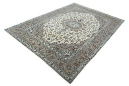 Corner detail of 2000s Kashan rug showing border pattern and Wool pile
