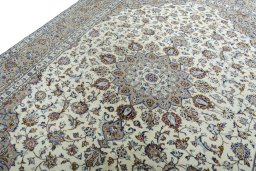 Backside of handmade 2000s Kashan rug showing knot structure and weave density