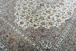 Close-up detail of 2000s Kashan rug from Iran / Persia showing Wool weave