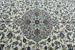 Central medallion detail of 2000s Kashan rug from Iran / Persia
