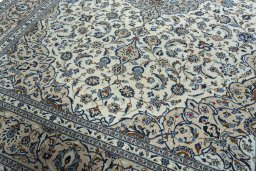 Close-up detail of 2000s Kashan rug from Iran / Persia showing Wool weave