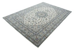Corner detail of New Kashan rug showing border pattern and Wool pile