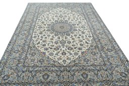 Surface texture of New Kashan rug with natural Wool and intricate pattern
