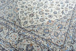 Close-up detail of New Kashan rug from Iran / Persia showing Wool weave