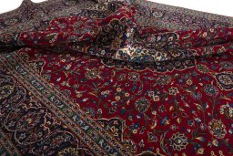 Surface texture of 2000s Kashan rug with natural Wool and intricate pattern
