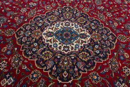 Central medallion detail of 2000s Kashan rug from Iran / Persia