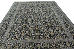 Surface texture of 2000s Kashan rug with natural Cork and intricate pattern