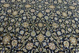 Central medallion detail of 2000s Kashan rug from Iran / Persia