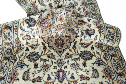 Close-up detail of 2000s Kashan rug from Iran / Persia showing Wool weave