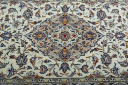Central medallion detail of 2000s Kashan rug from Iran / Persia