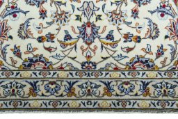 Close-up detail of 2000s Kashan rug from Iran / Persia showing Wool weave
