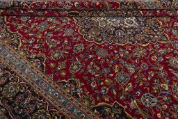 Close-up detail of 2000s Kashan rug from Iran / Persia showing Wool weave