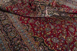 Surface texture of 2000s Kashan rug with natural Wool and intricate pattern