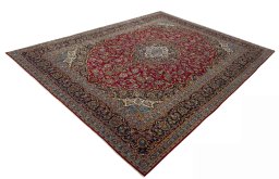 Corner detail of 2000s Kashan rug showing border pattern and Wool pile