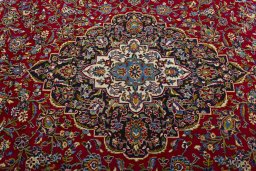 Central medallion detail of 2000s Kashan rug from Iran / Persia