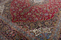 Close-up detail of 2000s Kashan rug from Iran / Persia showing Wool weave