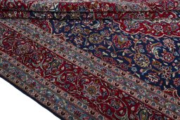 Close-up detail of 2000s Kashan rug from Iran / Persia showing Wool weave