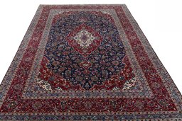 Surface texture of 2000s Kashan rug with natural Wool and intricate pattern