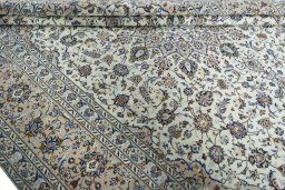 Close-up detail of 2000s Kashan rug from Iran / Persia showing Wool weave