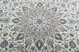Central medallion detail of 2000s Kashan rug from Iran / Persia