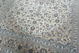 Close-up detail of 2000s Kashan rug from Iran / Persia showing Wool weave