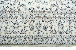 Full view of New Kashan rug from Iran / Persia, 341 × 242 cm in Beige tones