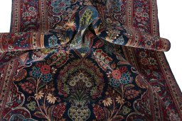 Surface texture of 1930s Kashan rug with natural Wool and intricate pattern