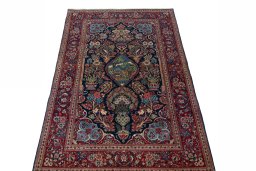 Surface texture of 1930s Kashan rug with natural Wool and intricate pattern