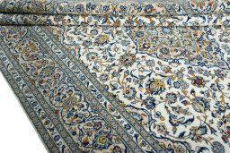 Close-up detail of 2000s Kashan rug from Iran / Persia showing Wool weave