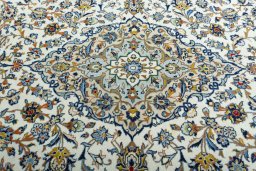 Central medallion detail of 2000s Kashan rug from Iran / Persia
