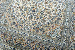 Close-up detail of 2000s Kashan rug from Iran / Persia showing Wool weave