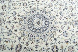 Central medallion detail of 2000s Kashan rug from Iran / Persia