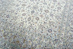 Close-up detail of 2000s Kashan rug from Iran / Persia showing Wool weave