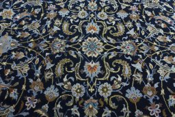 Central medallion detail of 2000s Kashan rug from Iran / Persia
