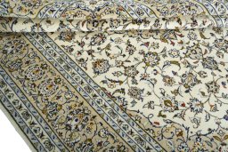 Close-up detail of 2000s Kashan rug from Iran / Persia showing Wool weave