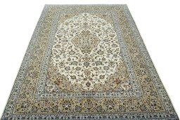 Surface texture of 2000s Kashan rug with natural Wool and intricate pattern