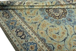 Close-up detail of 2000s Kashan rug from Iran / Persia showing Wool weave