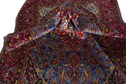 Close-up detail of 2000s Kashan rug from Iran / Persia showing Wool weave