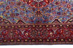 Full view of 2000s Kashan rug from Iran / Persia, 172 × 116 cm in Blue tones