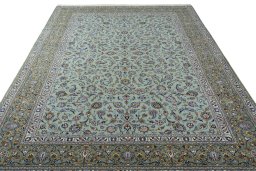 Surface texture of 2000s Kashan rug with natural Wool and intricate pattern