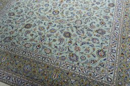 Central medallion detail of 2000s Kashan rug from Iran / Persia