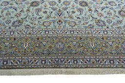 Close-up detail of 2000s Kashan rug from Iran / Persia showing Wool weave