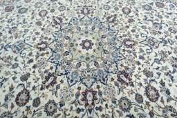 Central medallion detail of 2000s Kashan rug from Iran / Persia