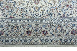 Full view of 2000s Kashan rug from Iran / Persia, 389 × 300 cm in Beige tones