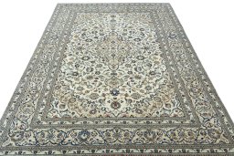 Surface texture of 2000s Kashan rug with natural Wool and intricate pattern