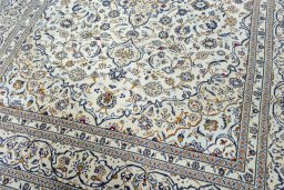 Close-up detail of 2000s Kashan rug from Iran / Persia showing Wool weave